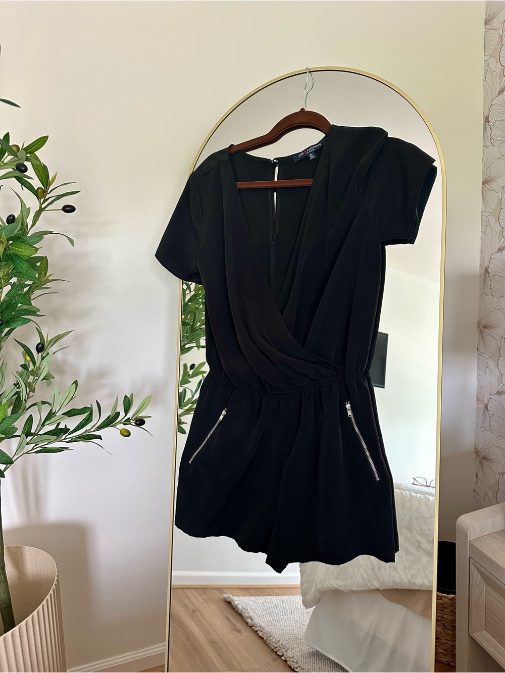 Women’s Black Short Sleeve Romper with Zip Pockets
